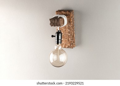 Vintage Wall Lamp To Illuminate The Terrace. Antique Lamp With Edison Bulb. The Concept Of Saving Energy Or Lack Of Ideas. Turned Off Lamp On A Light Background.