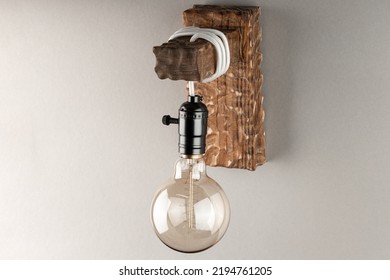 Vintage Wall Lamp To Illuminate The Terrace. Antique Lamp With Edison Bulb. The Concept Of Saving Energy Or Lack Of Ideas. Turned Off Lamp On A Light Background.