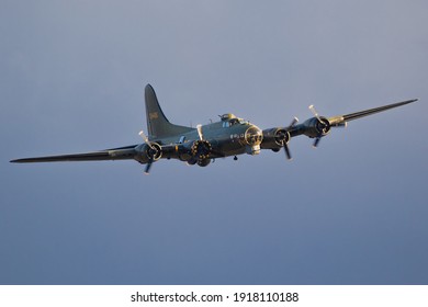 Vintage Warbird US Air Force Boeing B-17 Flying Fortress WW2 Bomber Plane Perforing At The Sanice Sunset Airshow. Belgium - September 13, 2019.