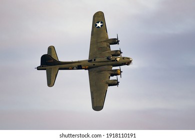 Vintage warbird US Air Force Boeing B-17 Flying Fortress WW2 bomber plane perforing at the Sanice Sunset Airshow. Belgium - September 13, 2019.