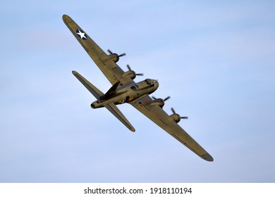 Vintage Warbird US Air Force Boeing B-17 Flying Fortress WW2 Bomber Plane Perforing At The Sanice Sunset Airshow. Belgium - September 13, 2019.