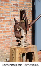 Vintage Water Pump In Rural Taiwan. A Cast Iron Hand Press Pump.