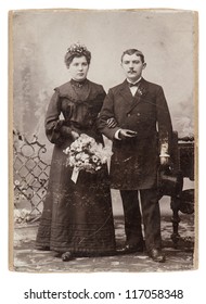 vintage wedding studio photo. just married couple circa 1900. nostalgic picture