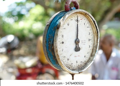 Vintage Weights On The Asian Market To Weigh Fruits, Vegetables And Fish. Stock Photo