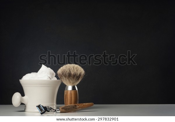 vintage wet Shaving\
Equipment on white\
Table