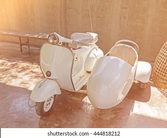 Vintage White Scooter With Sidecar