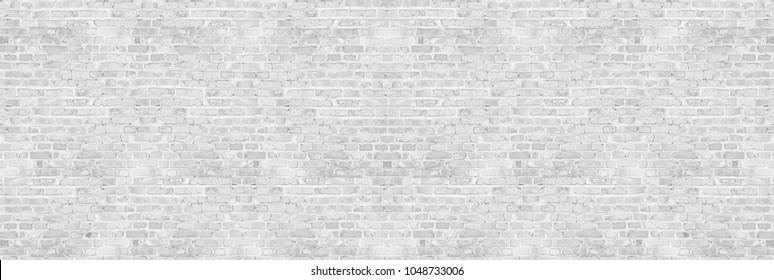Vintage white wash brick wall texture for design. Panoramic background for your text or image.