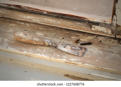 Vintage Window Restoration, Putty Knife And Old Removed Paint From Wood