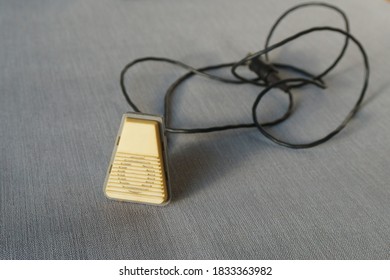 Vintage Wired Microphone Isolated On Blue Background. No People. Copy Space. Technology, Vintage And Audioblog Concept