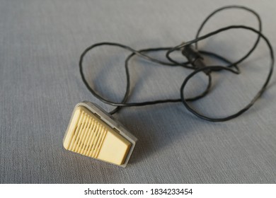 Vintage Wired Microphone Isolated On Blue Background. No People. Copy Space. Technology, Vintage And Audioblog Concept