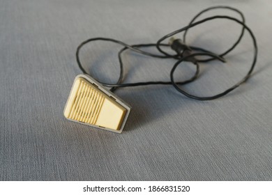 Vintage Wired Microphone Isolated On Blue Background. No People. Copy Space. Technology, Vintage And Audioblog Concept