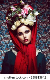 Vintage. Woman in Red Shawl and wreath of Roses. Retro