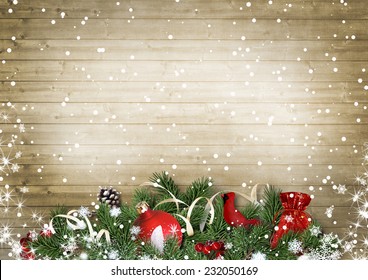 Vintage wood texture with snow, holly,firtree, cardinal.Christma