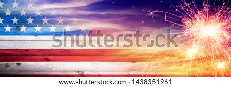 Vintage Wooden American Flag Fading Into Sunset Sky With Sparklers - Independence Day Concept