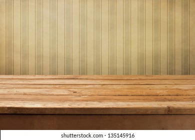 Vintage Wooden Deck Table Over Retro Wallpaper