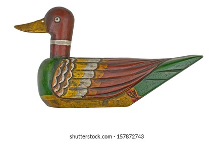 vintage wooden duck decoy isolated on white with clipping path