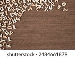 Vintage Wooden Letters on Brown Wooden Background Copy Space