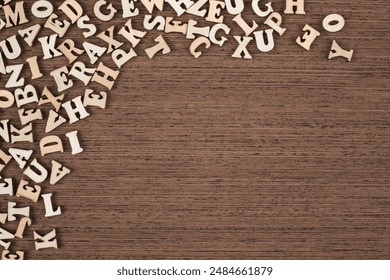 Vintage Wooden Letters on Brown Wooden Background Copy Space - Powered by Shutterstock