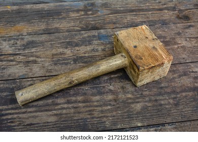 Vintage wooden mallet.Mallet Hammer Made Of Burl Wood Tools For Used By Carpenter In Workshop.