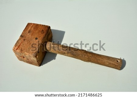 Vintage wooden mallet.Mallet Hammer Made Of Burl Wood Tools For Used By Carpenter In Workshop.