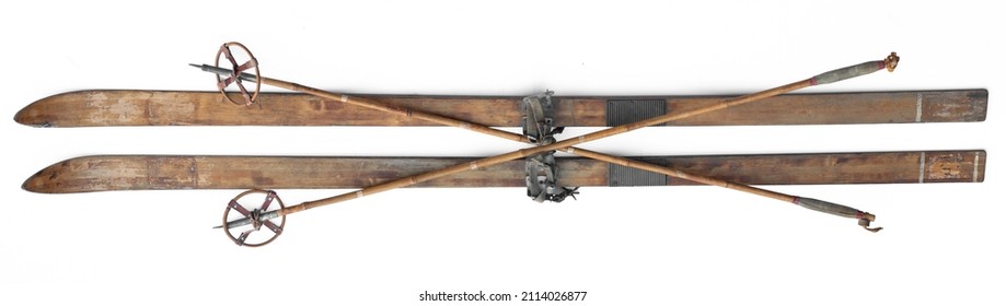 Vintage Wooden Skis And Ski Poles Isolated On White Background