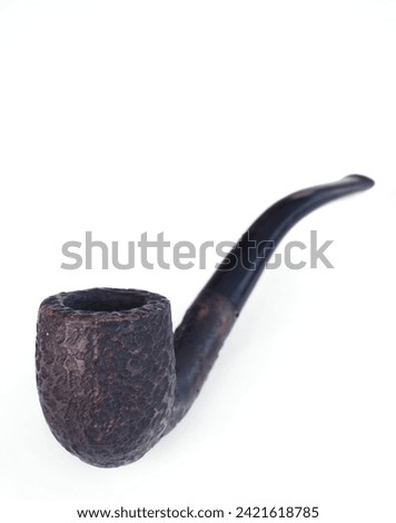 vintage wooden smoking pipe on a white background 