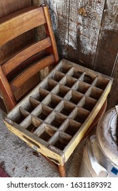 Vintage Wooden Soda Crate And Wooden Chair For Sale At An Antique Shop. Maine, USA	
