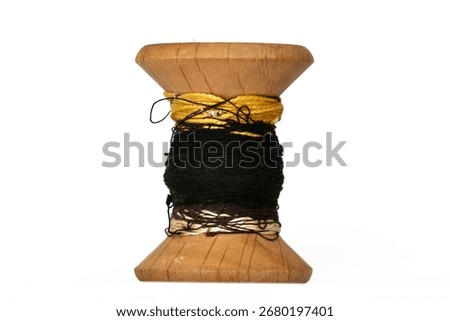 Vintage wooden thread spools rustic needlework concept