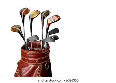 Vintage Worn Golf Clubs In An Old Bag Isolated Over A White Background With A Clipping Path