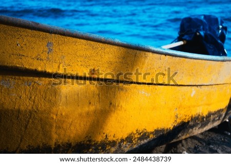 Similar – Image, Stock Photo Yellow fishing boat moored in ocean turquoise water