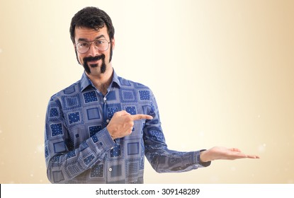 Vintage Young Man Pointing And Holding Something 