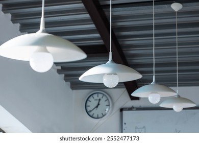 A vintagestyle clock, elegantly hanging from the ceiling of the room, clearly shows the time as precisely 420 in the afternoon hour