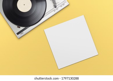 Vinyl Player With Long Play Or LP Record And Empty Blank Cover On Yellow Background. Top View.