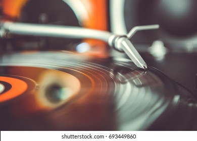 Vinyl Record With Music On Retro Dj Turntable Player. Turntables Needle On Analog Disc With Hip Hop Music. Listen To The Musical Tracks In Hi Fi Quality With Vintage Turn Table Device