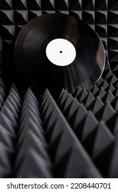 Vinyl Record On Acoustic Insulation Panel. Music Concept, Recording Studio. Space For Text.