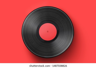 Vinyl record on a colored background. Old vintage vinyl record isolated