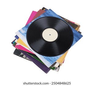 Vinyl record on a stack paper envelopes. Analog sound. Classic audio. Isolated on white background