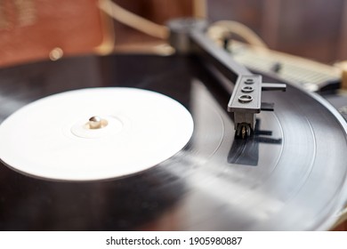 Vinyl record player. Needle player close up. Retro vinyl record player. - Shutterstock ID 1905980887