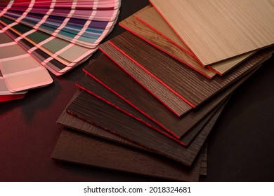 vinyl samples with wooden grain texture on dark background