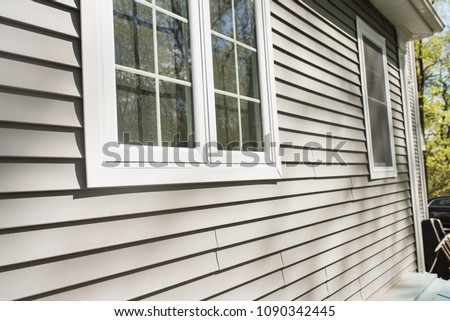 vinyl siding on house with window frames
