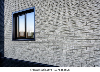 Vinyl Siding And Windows On New House Construction.