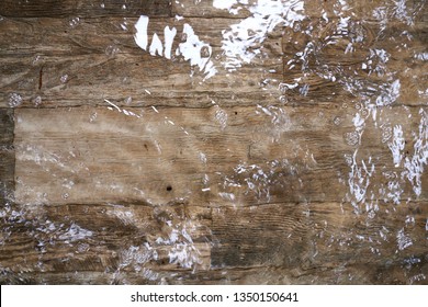 Vinyl Wood Flooring In A Home Interior Is Covered In Water After A House Flood Following A Rain Storm.