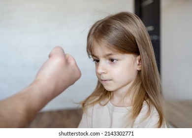 Violence Against Children. Father Scolds And Threaten Her Child Girl. Family Relationships. Discipline, Yelling, Spanking Concept.