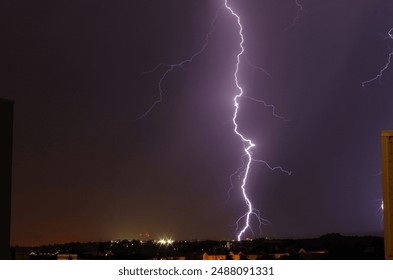 Violent lightning discharge during a thunderstorm over Central Hesse, Germany. - Powered by Shutterstock