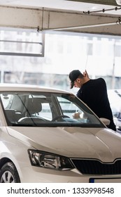 Violent Man Is Robbing A Car On The Parking