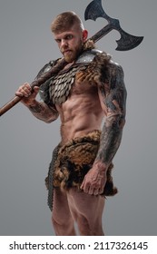 Violent Viking With Muscular Build And Axe On His Shoulder