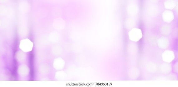 Violet abstract blur backdrop and hexagonal white bokeh. Banner background with copy space.