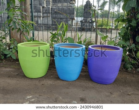violet blue decorative plant pots to decorate homes and outdoor gardens