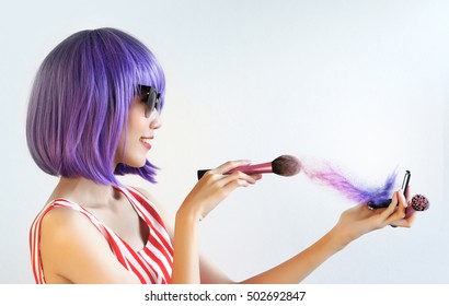 Violet Hair Woman Playing With Makeup Accessories And Colorful Splashing Powder Like Magic