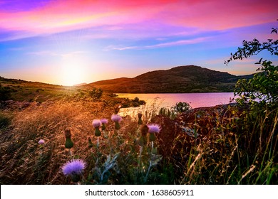 Violet hour at sunset in the valley of Wichita Mountains Wildlife Refuge near Lawton, Oklahoma, USA.